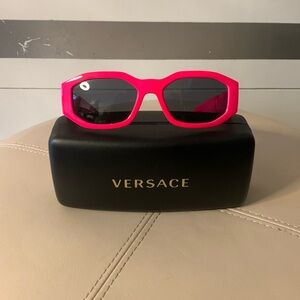 Neon pink Versace sunglasses